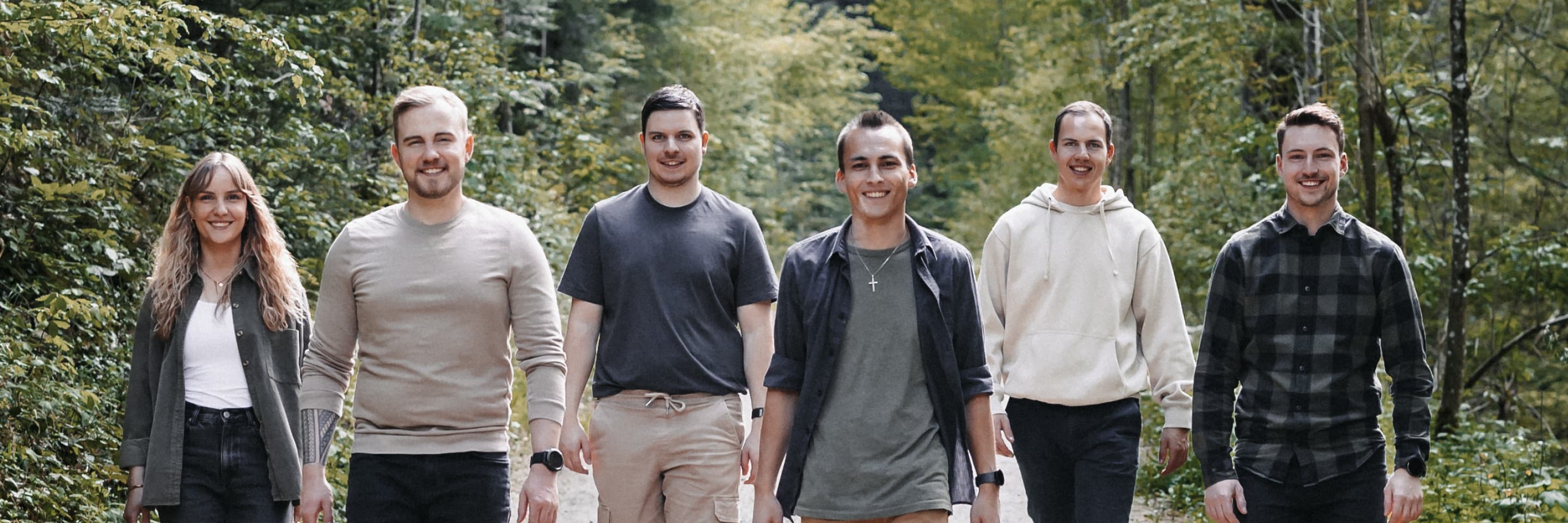 The band walking through the forest